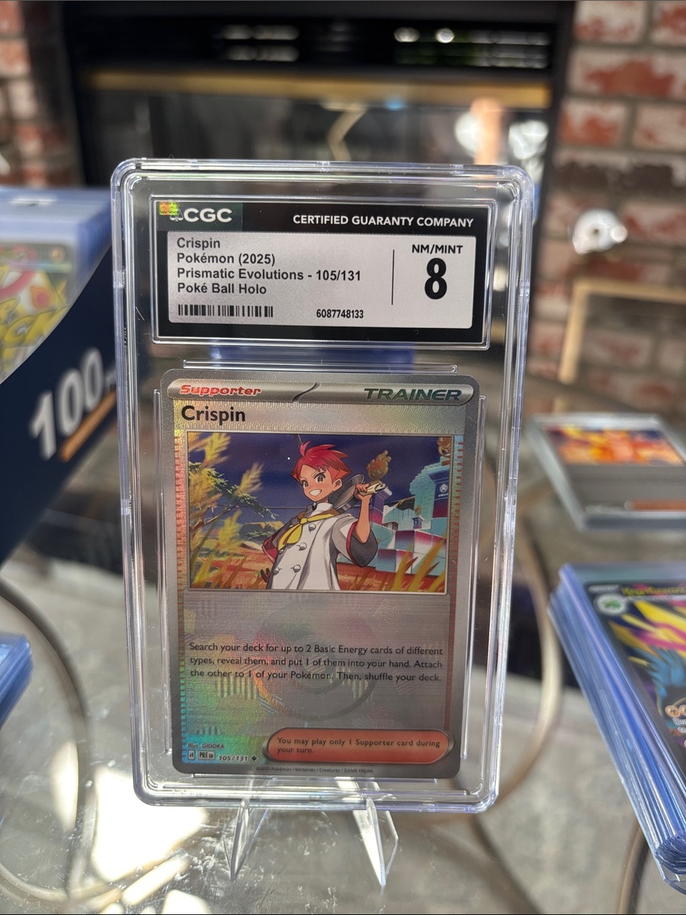 CGC 8 Crispin Pokemon Prismatic Evolutions Poké Ball Holo 105/131